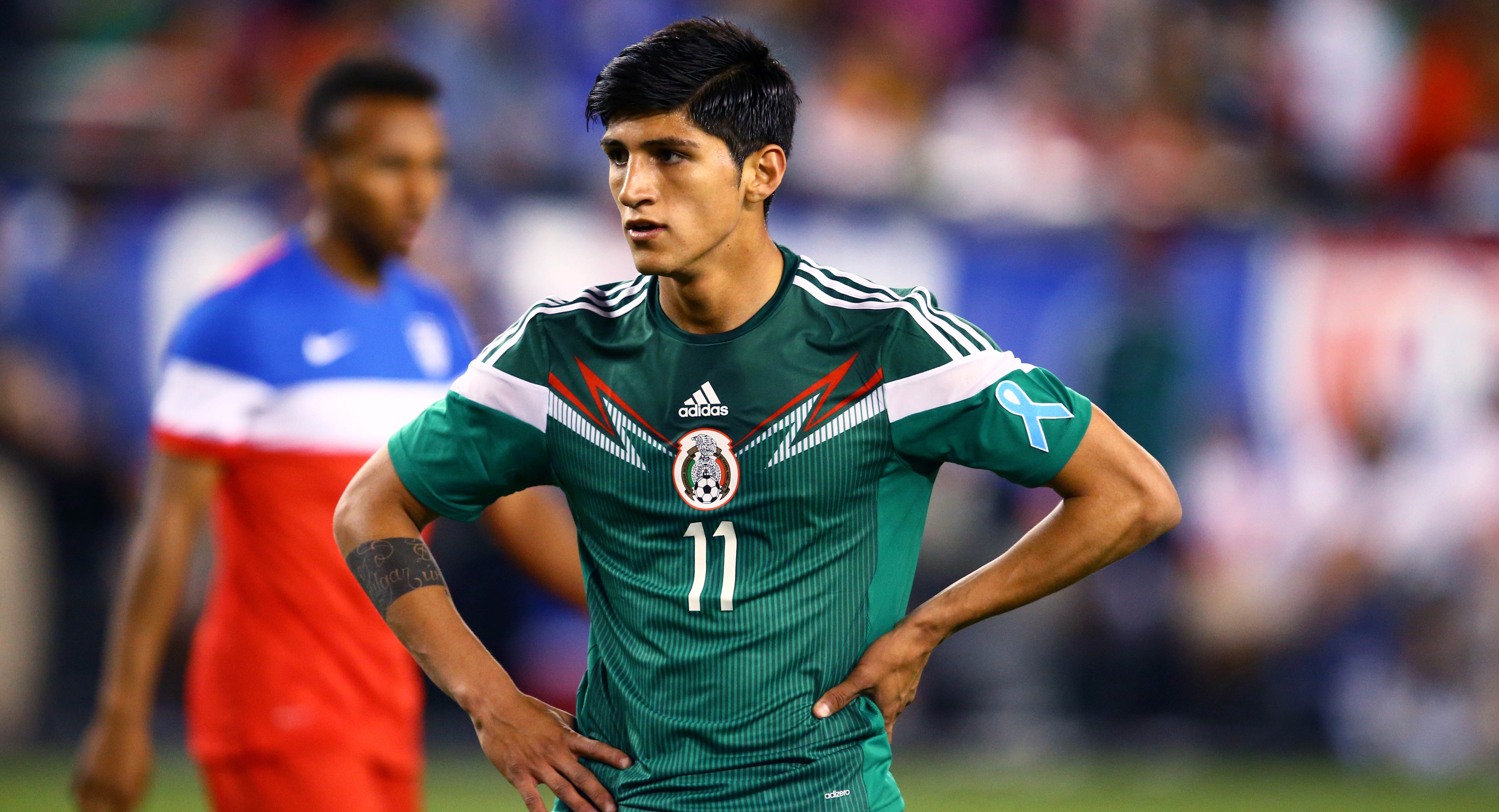 Mexico forward Alan Pulido playing against USA during a friendly match in 2014 (Credit: Mark J. Rebilas/USA TODAY)