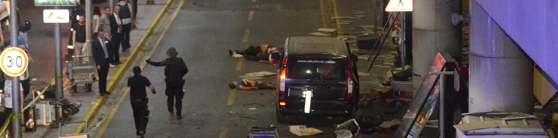 Bodies lying lifeless outside the airport where one of the bombs went off (Photo: Al Jazeera)