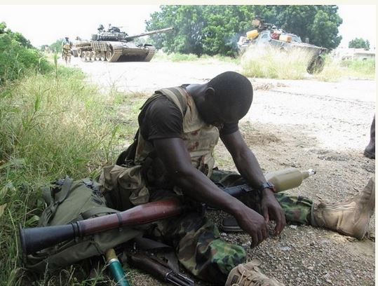 Nigerian soldier taking a snooze
