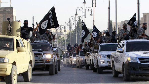 ISIS vehicles parading the streets of Northern Raqqa Province in Syria (Photo: Reuters)