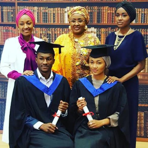 Wife of the President of Nigeria, Aisha Buhari (middle) with her children. Sitting down are Yusuf and Zahra who graduated from the University of Surrey yesterday